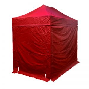 Red outdoor gazebo, with 4 red walls and door way